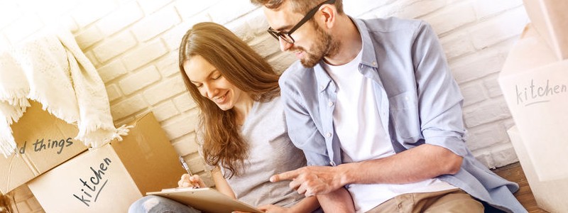 young couple preparing for a household relocation