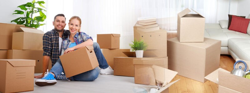 young couple with their household preparing for a relocation