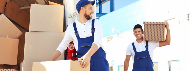 young professionals loading a truck