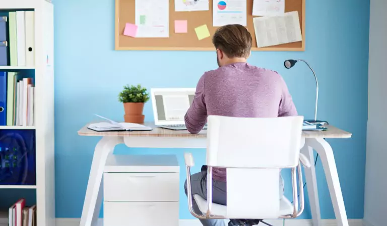 young man working in his office