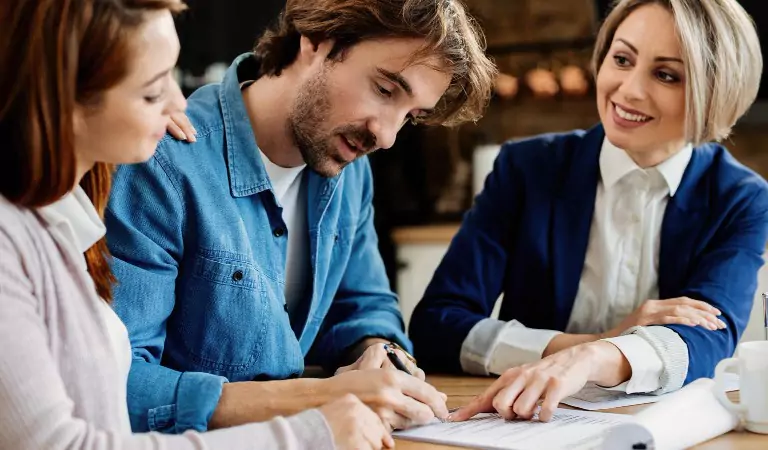 couple signing a lease agreement